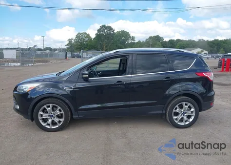 2014 Ford Escape Titanium z USA, uszkodzony, nr VIN 1FMCU9J98EUC99428